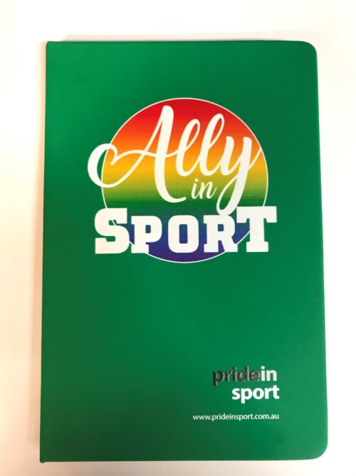 Image is of a bright green notebook with a large round rainbow emblem behind the words Ally in Sport in white centred towards the top. A small Pride in Sport logo is at the bottom of the cover.